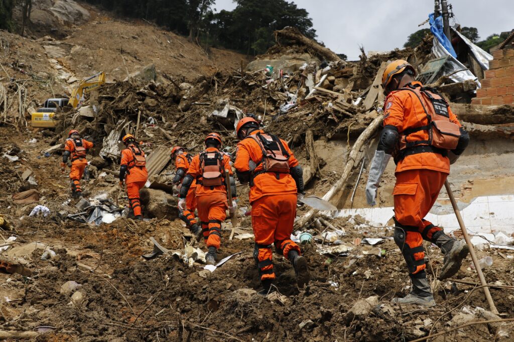 Landslide in Petropolis City, Rio de Janeiro, Brazil. Firefighters teams working search and rescue for victims of rain at Morro da Oficina. 02.25.2022